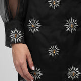 SAIA CURTA PRETA COM FLORES