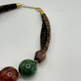 COLAR TECIDO ANIMAL PRINT COM BOLAS