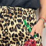 CALÇAS ANIMAL PRINT COM BORDADOS