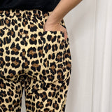 CALÇAS ANIMAL PRINT COM BORDADOS