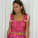 CONJUNTO TOP E SAIA ROSA
