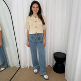 CALÇAS JEANS COM ENTRANÇADO