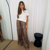 CALÇAS ANIMAL PRINT RISCAS LATERAIS