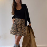 SAIA CURTA ANIMAL PRINT CAMEL