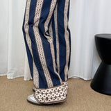 CALÇAS AZUIS ESTAMPADAS