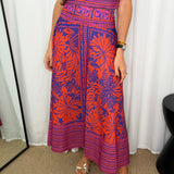 CONJUNTO TOP E SAIA ESTAMPADO ROXO E CORAL