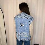 COLETE MALHA AZUL CORNUCÓPIAS