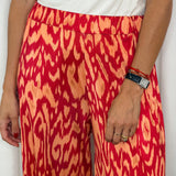 CALÇAS MALHA SEDA MANCHAS CORAL
