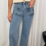 CALÇAS JEANS COM ENTRANÇADO