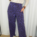 CALÇAS BAGGY ANIMAL PRINT ROXO