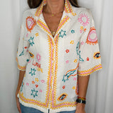 CAMISA COM BORDADOS