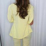 CONJUNTO TOP E CALÇAS AMARELO PASTEL