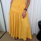 CONJUNTO TOP E SAIA MOSTARDA