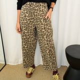 CALÇAS BAGGY ANIMAL PRINT BEGE