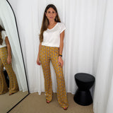 CALÇAS MALHA SEDA MOSTARDA ESTAMPADAS