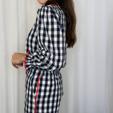 CONJUNTO CAMISA E CALÇAS VICHY COM VIVO VERMELHO