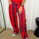 CALÇAS RISCAS VERMELHO E BERINGELA