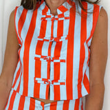 CONJUNTO TOP E CALÇAS RISCAS LARANJA E AZUL