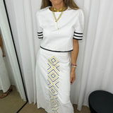 CONJUNTO TOP E SAIA BRANCO COM DEBRUM PRETO