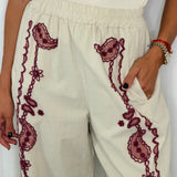CALÇAS BAGGY CRU COM BORDADOS