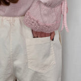 CALÇAS SARJA BOLSOS CHAPA CRU