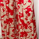 CALÇAS VERMELHAS COM LEOPARDOS