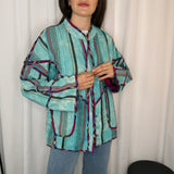 CASACO TURQUESA COM BORDADOS