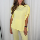 CONJUNTO TOP E CALÇAS AMARELO PASTEL