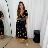 CONJUNTO TOP E SAIA PRETO ESTAMPADOS