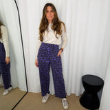 CALÇAS BAGGY ANIMAL PRINT ROXO