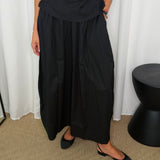 CONJUNTO TOP E SAIA PRETO