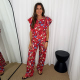 CONJUNTO TOP E CALÇAS BORDEAUX COM FLORES