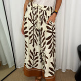 CALÇAS FOLHAS CASTANHAS