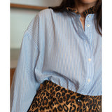 CAMISA RISCAS FOLHO ANIMAL PRINT